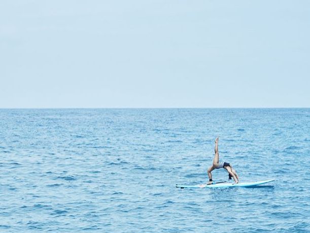 SUPヨガをするTAMAOさん