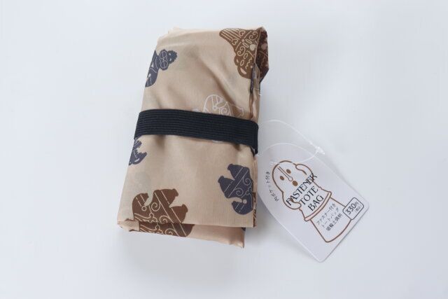 ダイソーのファスナー付きトートバッグ 埴輪土偶柄の商品タグ