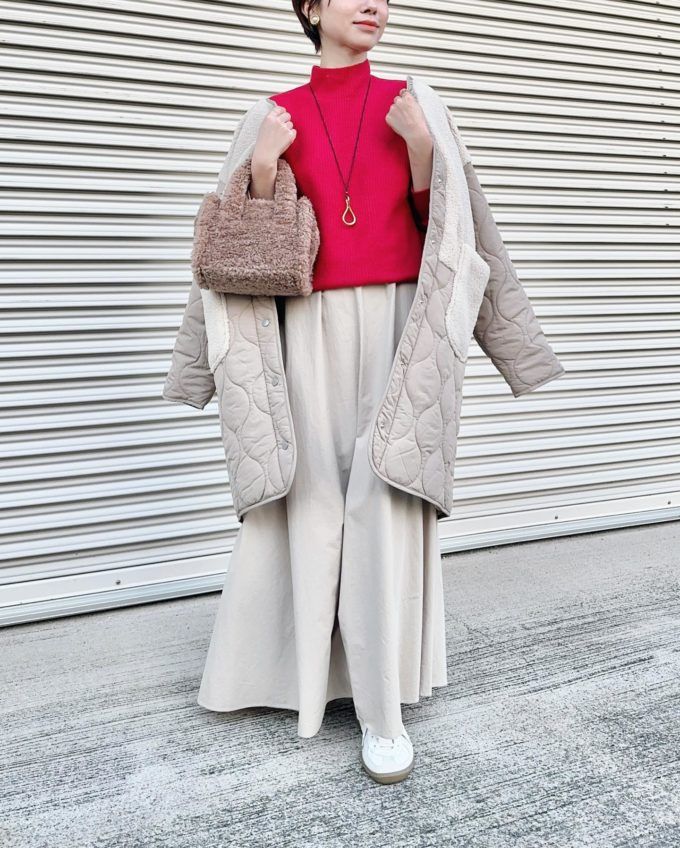 UNIQLOのレッドの「3Dスフレヤーンモックネックセーター(長袖)」