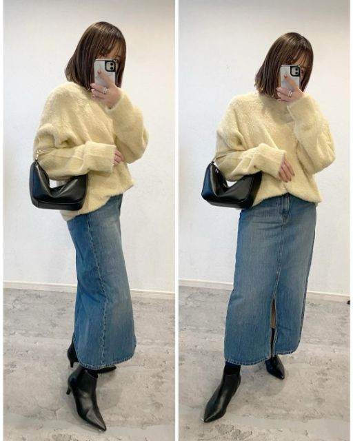 デニムロングスカートを着用している