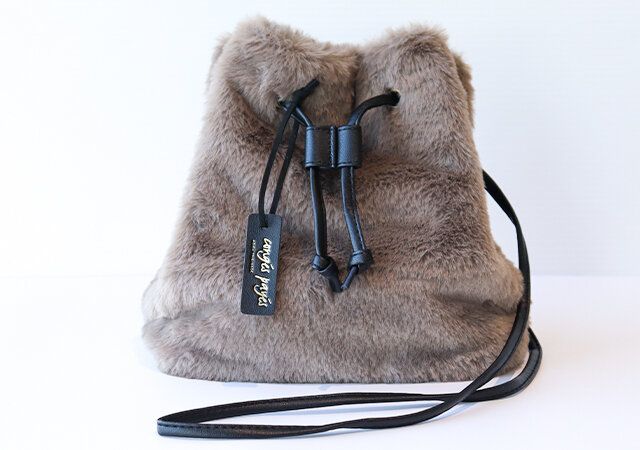 コンジェ ぺイエ アデュー トリステスの2way巾着バッグ