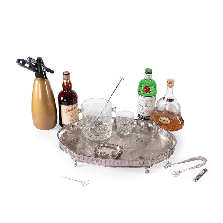 240124_The Queen Mother_ a selection of character bar props including a Champagne Swizzle Stick compiled by The Crown's Set Decorating Department. Estimate_ £60 - 80.jpg