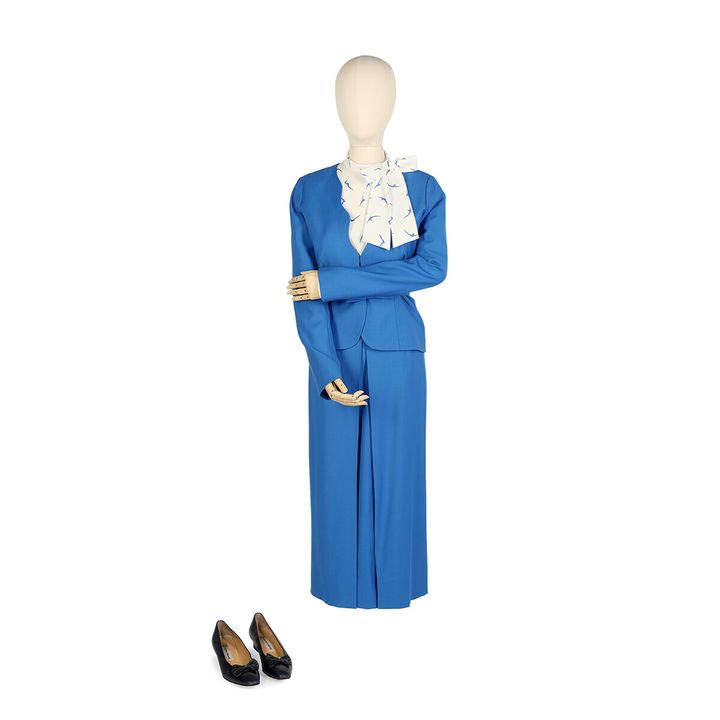 240124_Emma Corrin (as Lady Diana)_ Engagement announcement blue ensemble with pussybow shirt Season 4 Episode 3£1,500-2,000.jpg