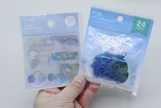 セリアのミニシール 22片 オーロラカラーとフレークシール 24P ぷっくりキャンディ