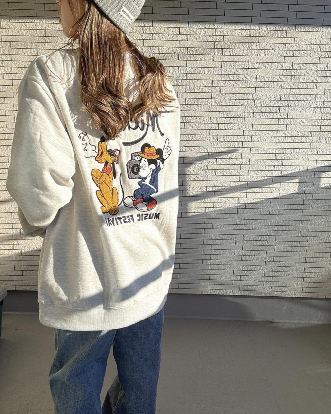 しまむらメンズの「サガラミッキープルートトレーナー」