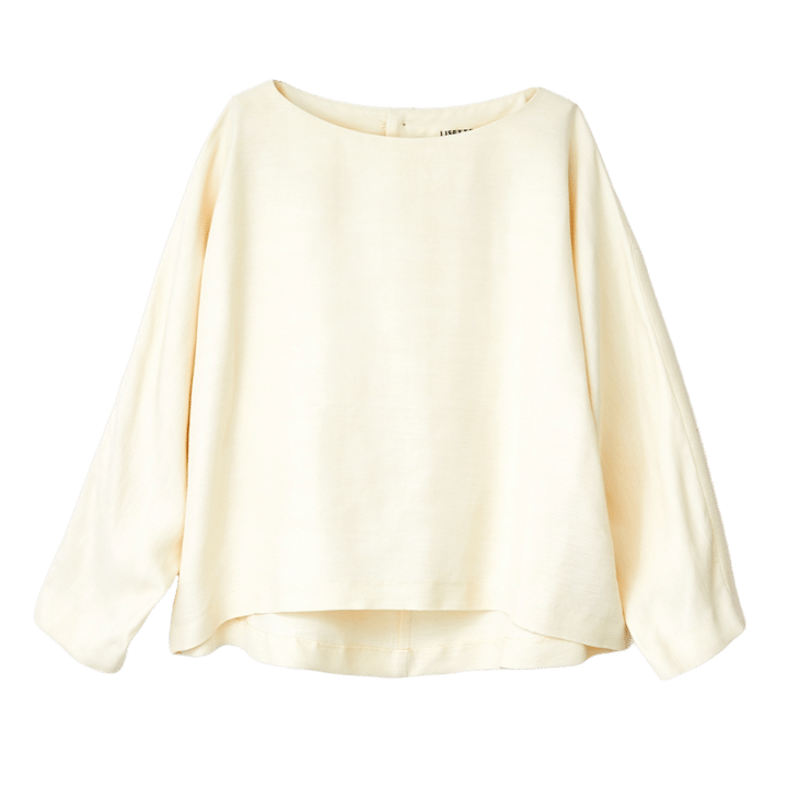 フォーマルの場面にふさわしい、シルク混素材の華やかなセットアップ