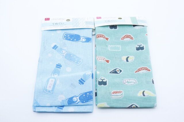 ダイソーのてぬぐい（ラムネ）とてぬぐい（寿司）のパッケージ