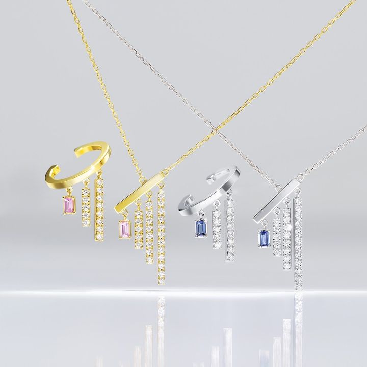 「シャンデリア バゲット」伊勢丹新宿店ポップアップショップ限定 イヤーカフ左耳用（YG×ダイヤモンド×ピンクサファイア）￥132,000 ネックレス（YG×ダイヤモンド×ピンクサファイア）￥209,000 イヤーカフ左耳用（WG×ダイヤモンド×ブルーサファイア）￥143,000 ネックレス（WG×ダイヤモンド×ブルーサファイア）￥220,000