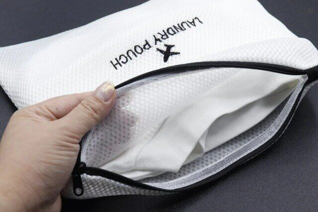 ダイソー トラベル収納ポーチ ウォッシャブル 大 Ｔシャツ入れる