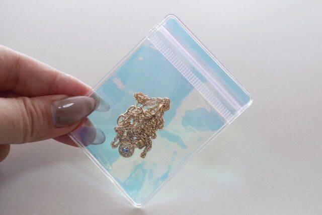 セリア ジップ付き収納ポーチオーロラM ネックレス