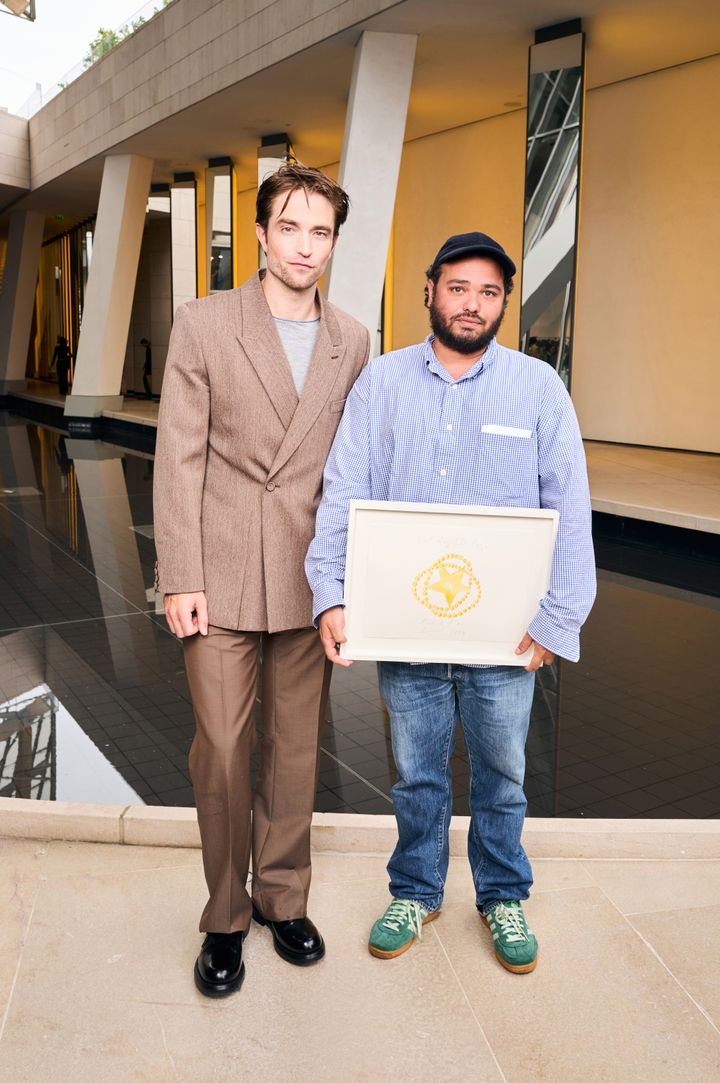 プレゼンターのロバート・パティンソンとデュラン・ランティンク。