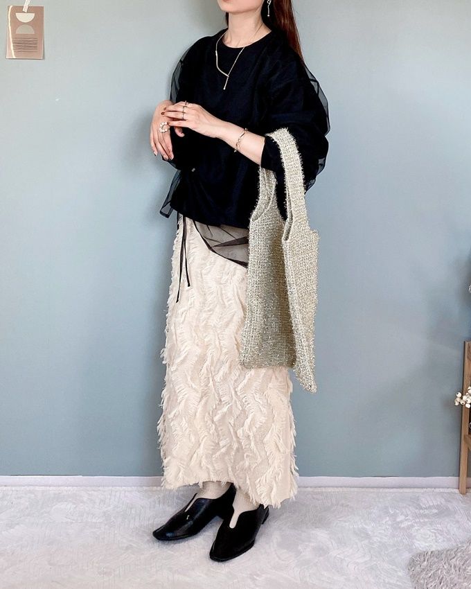 ドロストチュールプルオーバー×しまむらのクリームの「フリンジスカート」