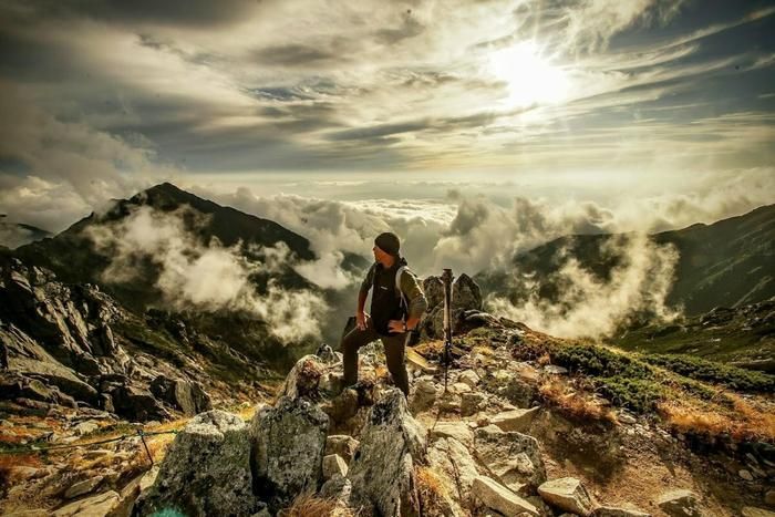 木曽駒ヶ岳の山頂にいる宮崎さん
