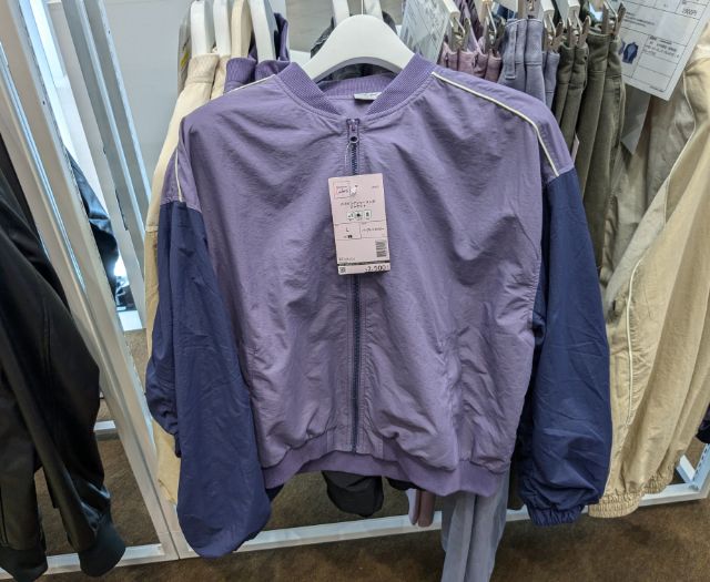 パープルのパイピングシャーリングジャケット