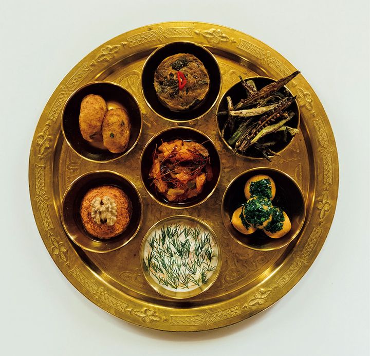 ルーツの料理は研修生の出身地によって替わる。中東の前菜「メゼ」のスタイルで提供された、モロッコ、トルコ、ガーナ料理の盛り合わせ。Photo_ Courtesy of Roots