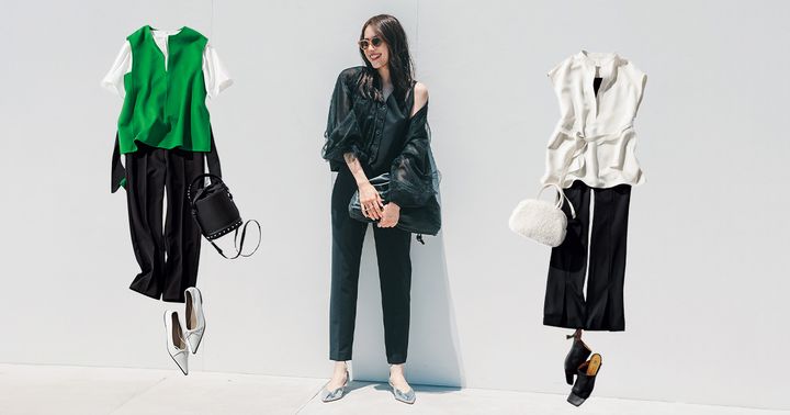 今年っぽいジレと黒パンツの組み合わせを着こなす笹川友里さん