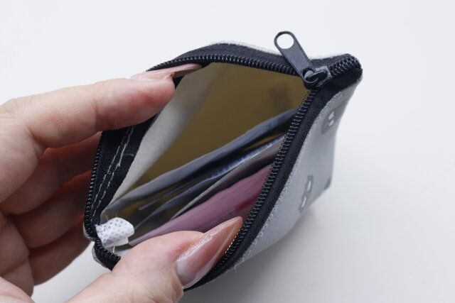 キャンドゥのマチがある40122 ミニポーチ（舟形）X／O 文字