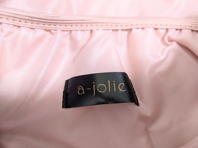 アジョリーキルティングバッグロゴ