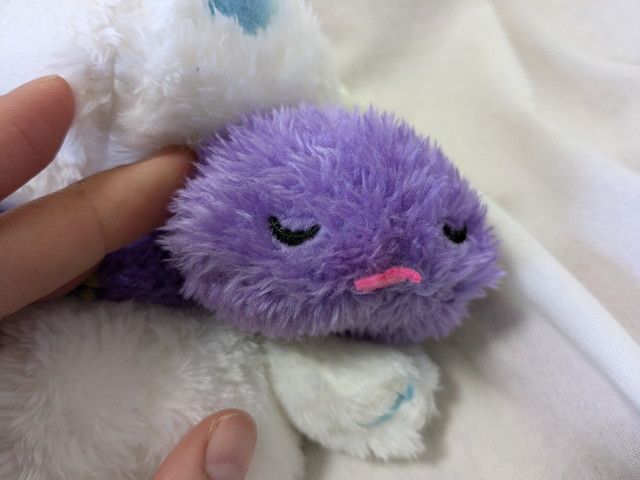 スヌーピーをデザインしたぬいぐるみポーチ