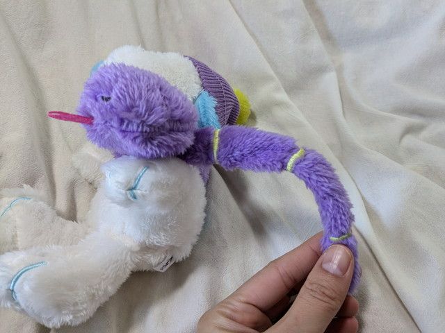 スヌーピーをデザインしたぬいぐるみポーチ