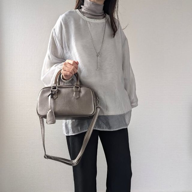 TT＊rumiゴウヒボストンを着用している