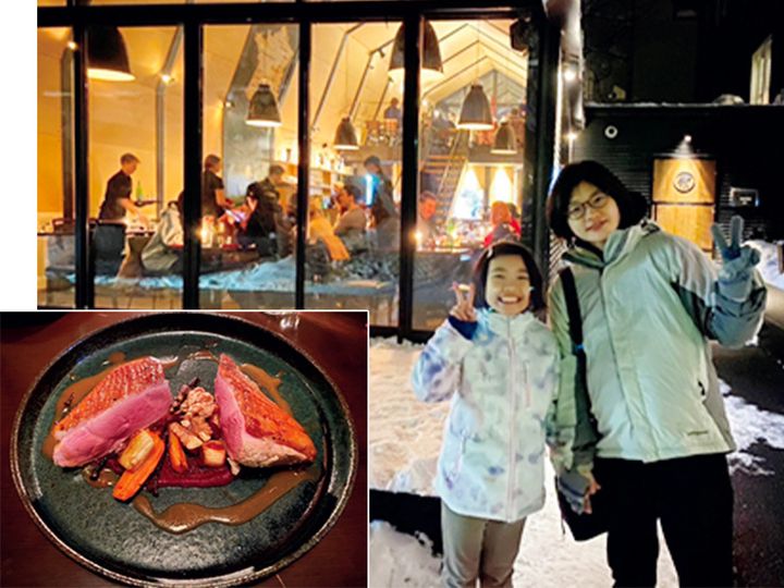 ニセコの人気レストランTHE BARNの料理と店の前で記念撮影する親子