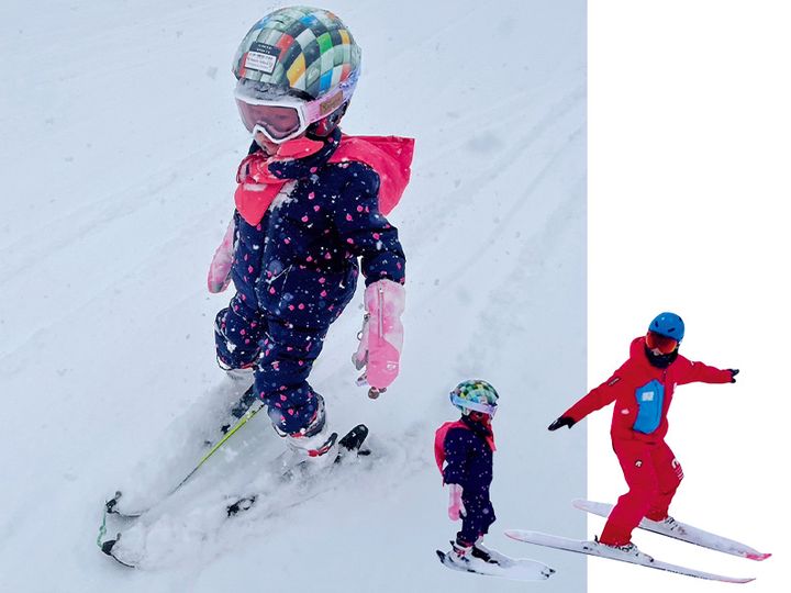 スキー場でインストラクターとレッスンする子ども