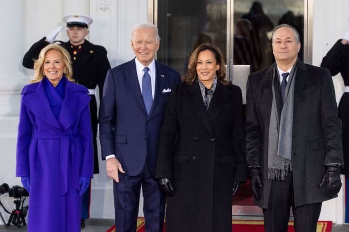 Image may contain_ Joe Biden, Jill Biden, Kamala Harris, Clothing, Coat, People, Person, Adult, Glove, and Accessories