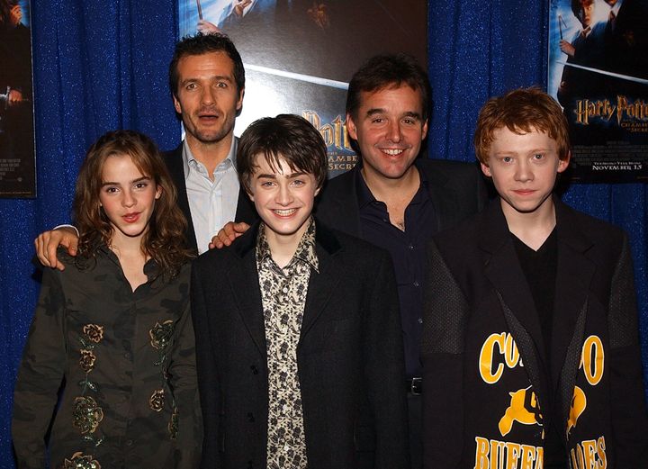 2001年、『ハリー・ポッターと賢者の石』のNYプレミアにて。左からエマ・ワトソン、プロデューサーのデヴィッド・ハイマン、ダニエル・ラドクリフ、クリス・コロンバス監督、ルパート・グリント。