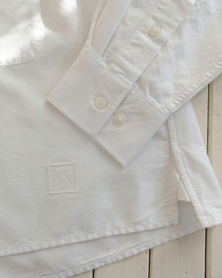 UNIQLO×JWANDERSON オックスフォードシャツ 裾に入ったロゴ刺繡