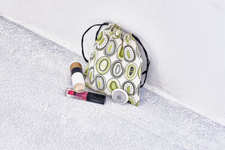 「エルメス」の口紅と「ジバンシー」のリップグロス。