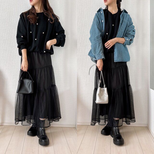 オールブラックにプラスするだけで春っぽい