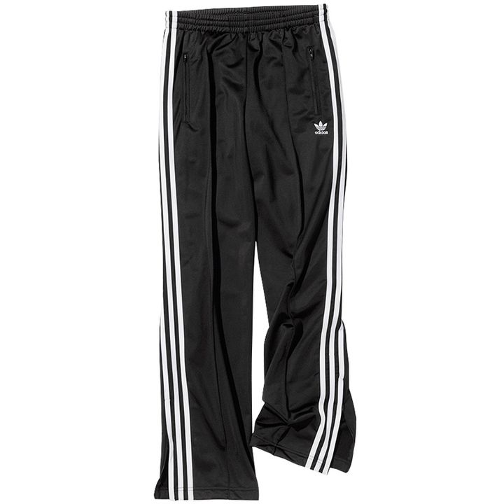 アディダスの裾のファスナーがついたオリジナルス ウーブントラックパンツ