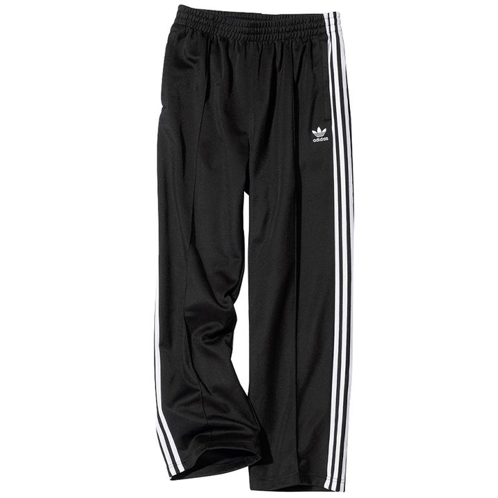 アディダスのアディカラー バギーフィットファイヤーバードトラックパンツ