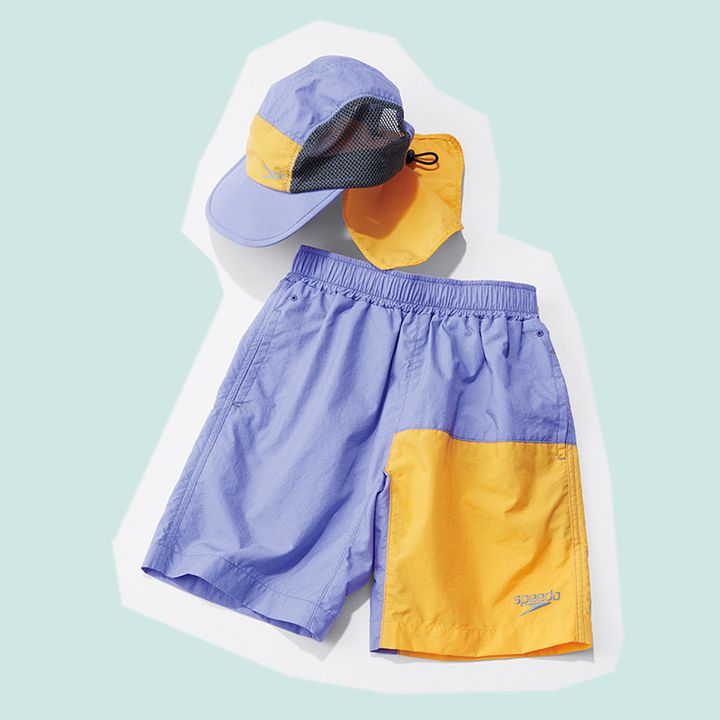 スピードのパープルとイエローのバイカラーのキッズキャップとスイムショーツ
