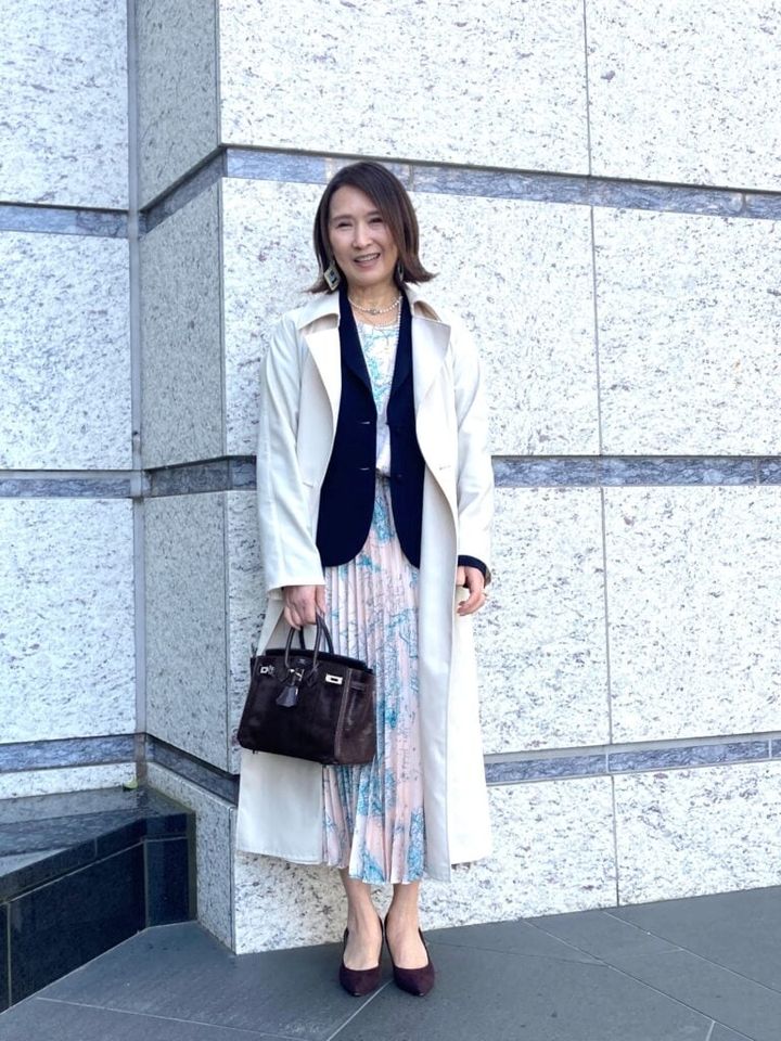 大西直実さん コートを着ているところ