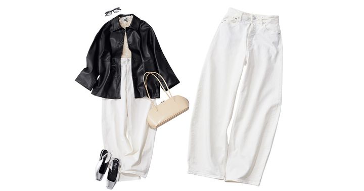 ヤヌークの白デニムとプリーツトップスにエコレザージャケットを羽織った着こなし