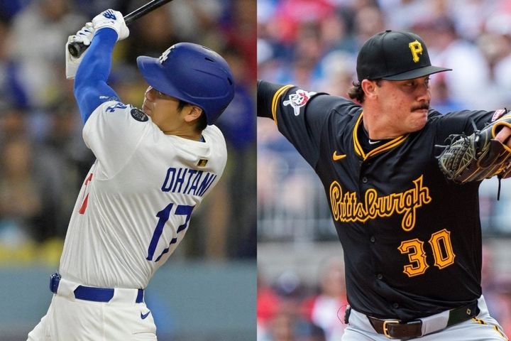 大谷翔平（左）とポール・スキーンズ（C）ロイター