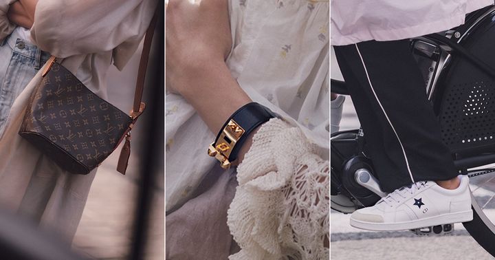 ルイ・ヴィトンのショルダーストラップ付きのバッグとエルメスのレザーブレスレットとディオールの白スニーカー