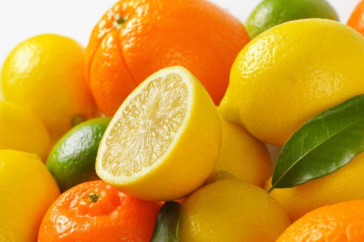 heap of fresh citrus fruit - close up