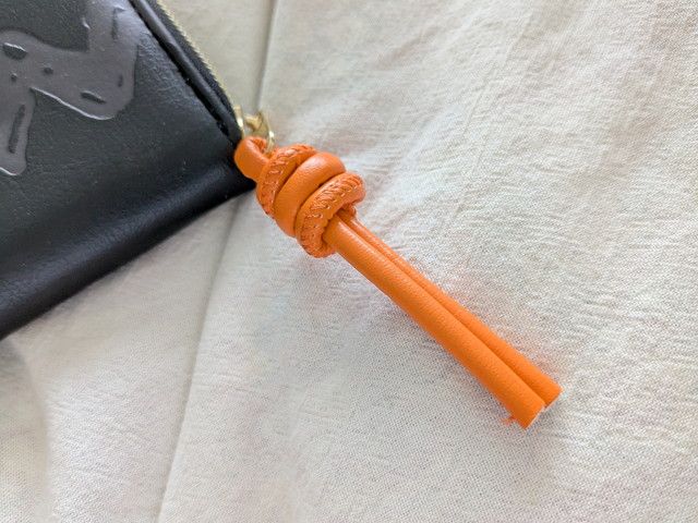 スヌーピー小さな長財布オレンジの持ち手
