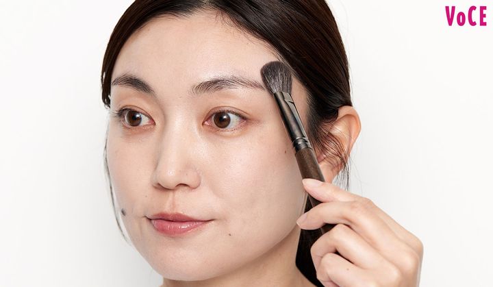 こめかみに重ねる