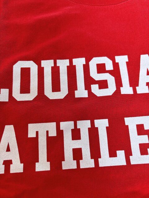 coca ビッグシルエットロングTシャツ レッド ロゴのアップ