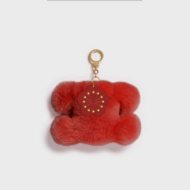 トリオンフ 梅モチーフ付き ポンポンチャーム 各￥90,200（税込、予定価格）※展開日、展開店舗についてはお問合せください。