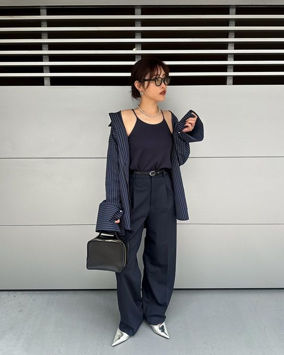 UNIQLOのネイビーの「クレープジャージーブラキャミソール」