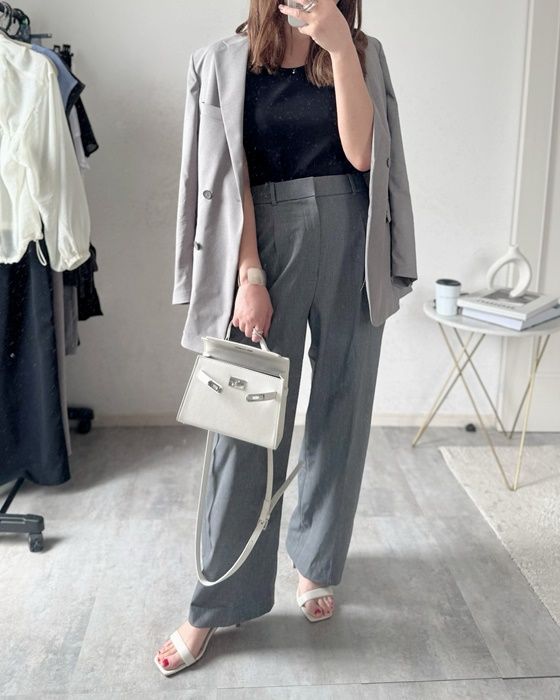 UNIQLOのブラックの「クレープジャージーブラキャミソール」