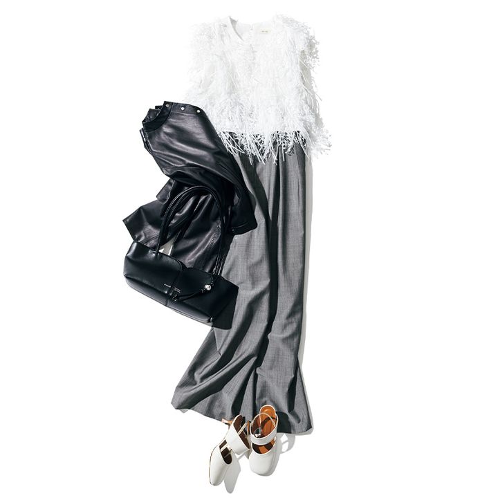 カラーレスな通勤服にフリンジベストをオンするだけで華やかさとモード感がアップ