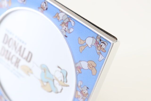 ダイソー フォトフレーム、丸（ドナルド＆デイジー）DC8 素材