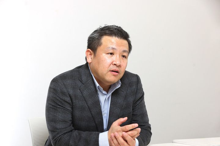 北米産牛肉の利点を語る辻田英雄さん。