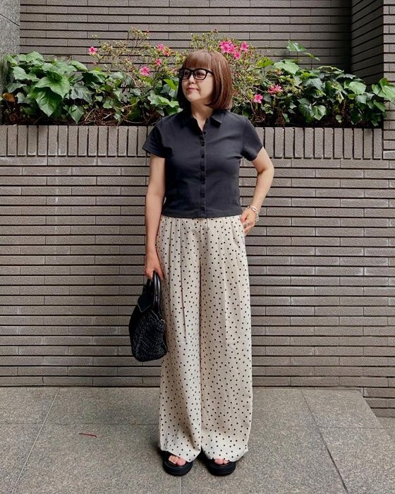 UNIQLOのブラックの「ミニポロシャツ半袖」